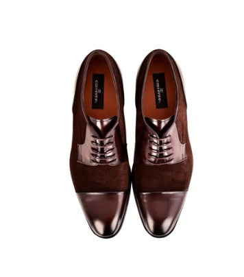 A pair of men's brown oxford shoes with a mix of suede and patent leather panels, shown from a top-down view on a white background.