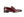 A single dark burgundy leather penny loafer with a polished finish and a low black stacked heel, shown in profile against a white background.