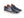 A pair of men's slip-on loafers in glossy navy blue leather with tan accents, set against a plain white background.