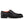 A single black textured leather oxford shoe with a thick lug sole and bright orange interior lining.