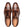 A pair of brown leather dress shoes with a cap toe and laces, shown from a top-down view on a white background. The brand name 'MEZLAN' is visible on the insoles.