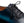 Close-up of a men's dress shoe showing the side panel, lace area, and toe cap on a white background.