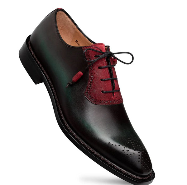 Men's oxford shoe featuring a glossy black leather toe and heel, contrasted with a deep red suede on the vamp, black laces, shown against a plain white background.