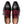 A pair of men's dress shoes shown from a top-down view, featuring a deep red suede vamp and black laces, on a white background.