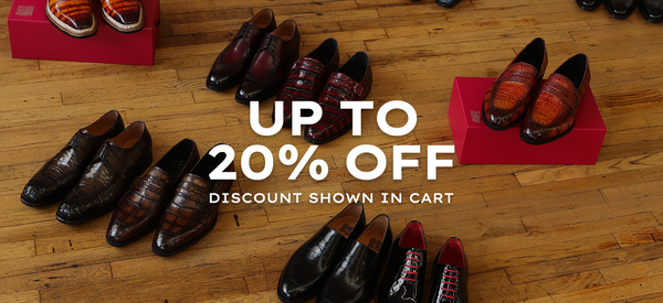 Assortment of C&E men’s dress shoes displayed on a wood floor with “Up to 20% Off, Discount Shown in Cart” promotional text.
