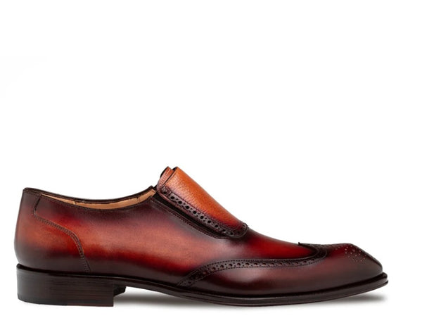 A single men's slip-on wingtip oxford shoe in glossy brown leather, shown in profile against a plain white background.