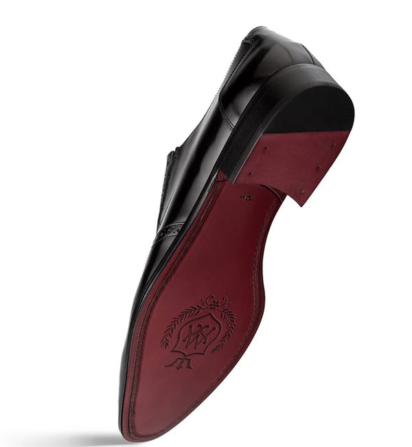 A single men's dress shoe shown from the side, featuring a glossy black leather upper and a contrasting deep burgundy-red sole with an embossed logo.