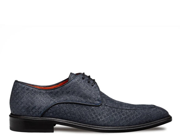 A single men's oxford dress shoe in textured navy blue leather with a subtle woven pattern, black laces, and a black sole.