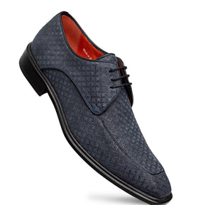 A men's navy blue oxford dress shoe with a textured, embossed pattern on the upper, and black laces.