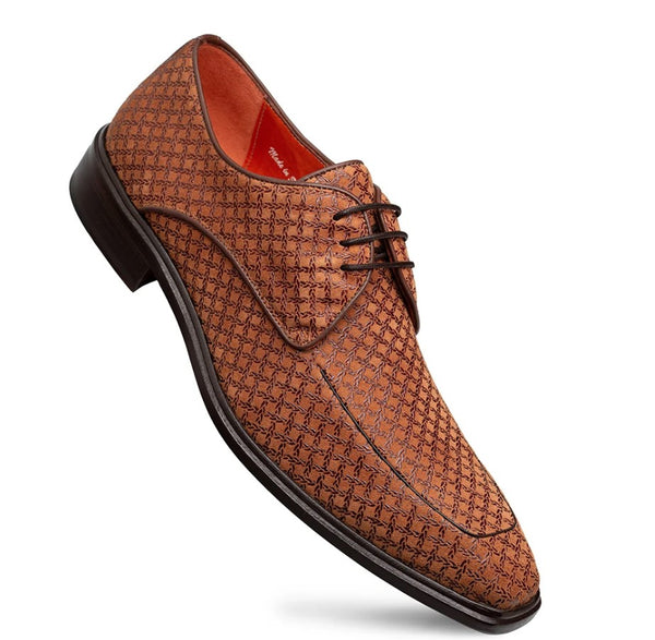 A men's brown leather oxford dress shoe with an embossed geometric monogram pattern, dark brown laces, and a black sole.