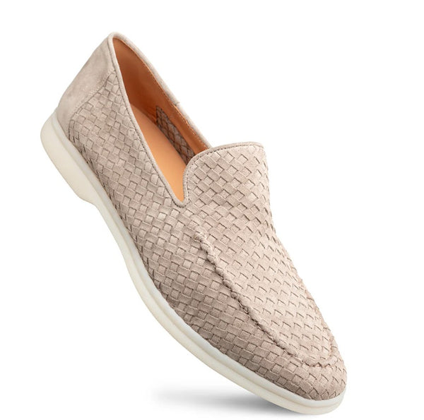 A single woven slip-on loafer in taupe with a white sole, shown at an angle on a white background.