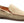 A close-up of a beige suede loafer with perforated detailing, brown stitching, and a brown leather interior, shown on a white background.
